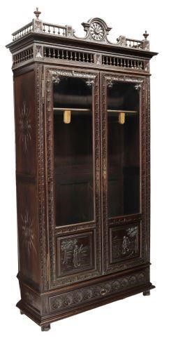 Appraisal: French Breton oak armoire bookcase late th c richly carved