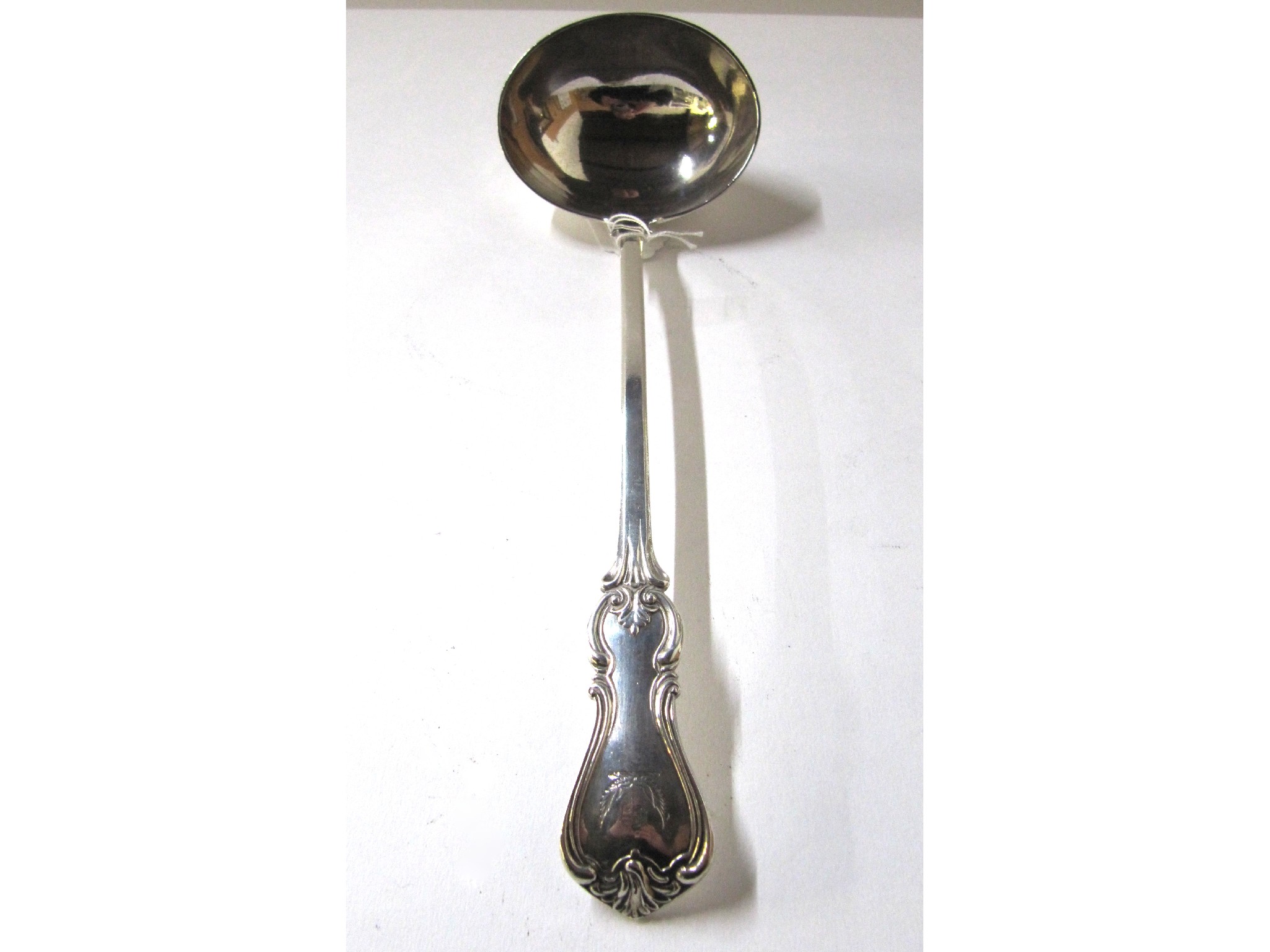 Appraisal: A silver soup ladle London