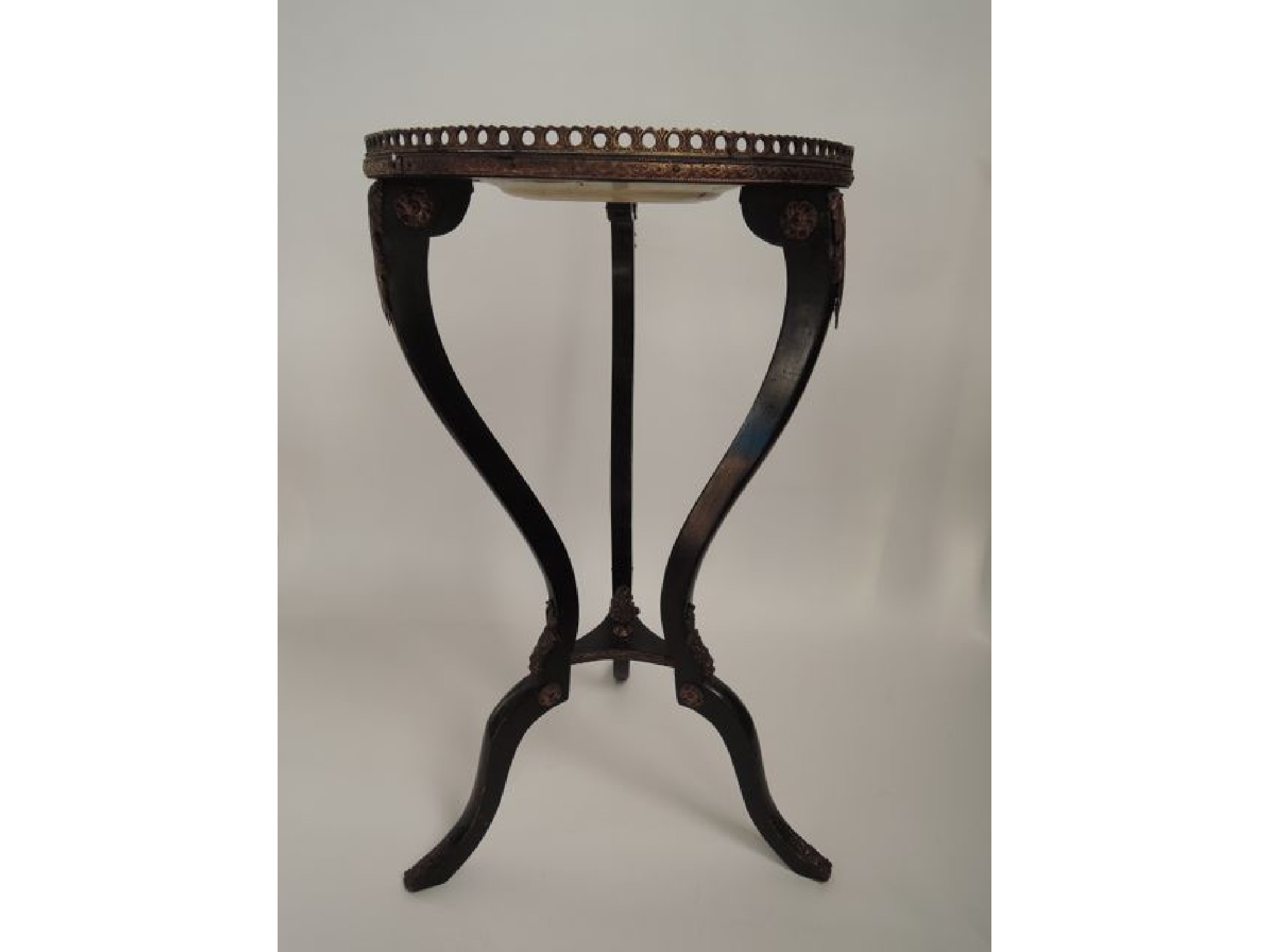 Appraisal: A th century French occasional table raised on three shaped