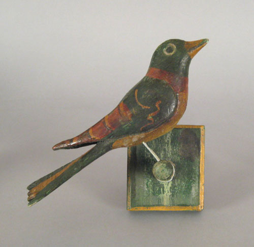 Appraisal: Carved and painted bird on a perch early th c