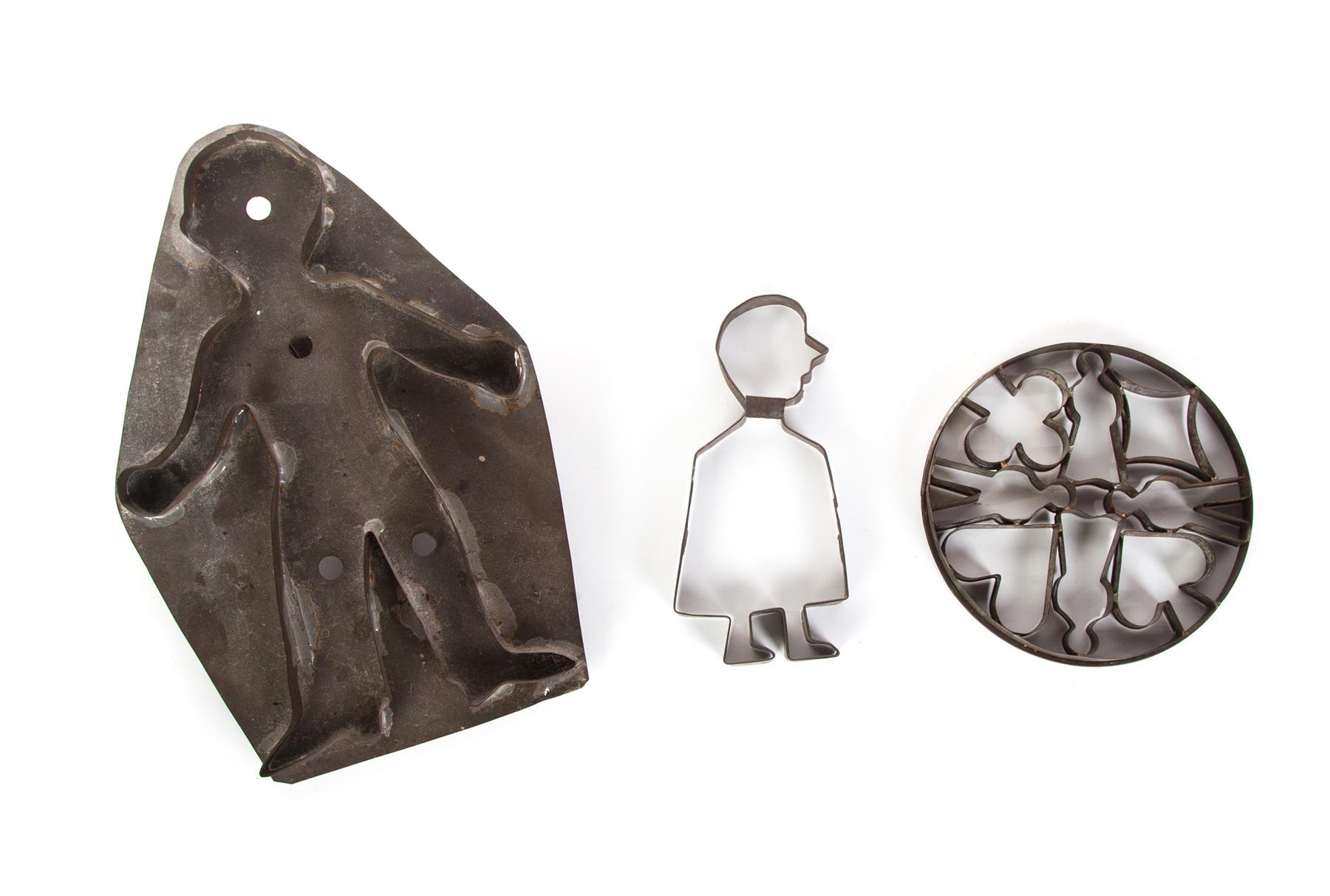 Appraisal: THREE AMERICAN TIN COOKIE CUTTERS First half- th century Man