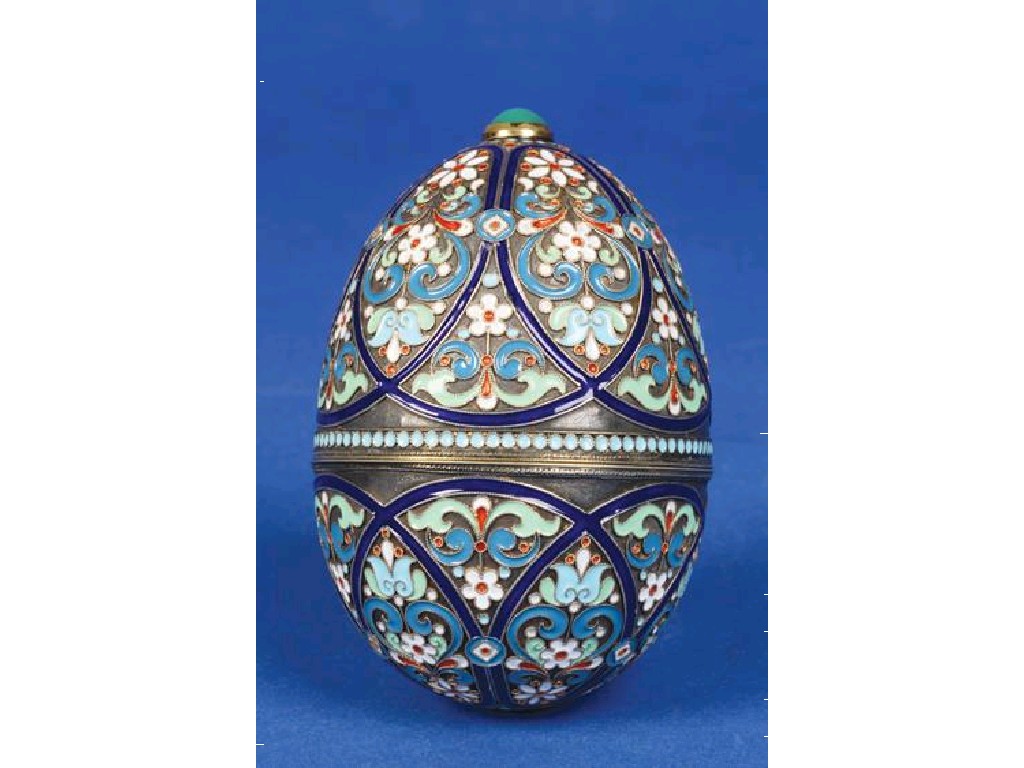 Appraisal: A RUSSIAN CHAMPLEVE ENAMEL EGG with domed covers and parcel