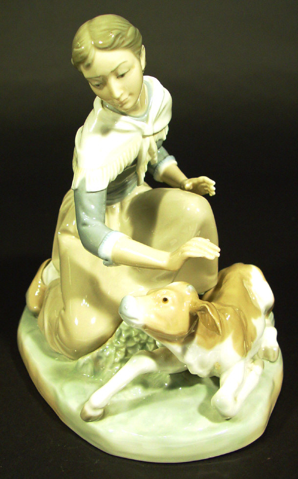 Appraisal: Lladro porcelain figure group 'Caressing a Calf' printed and impressed