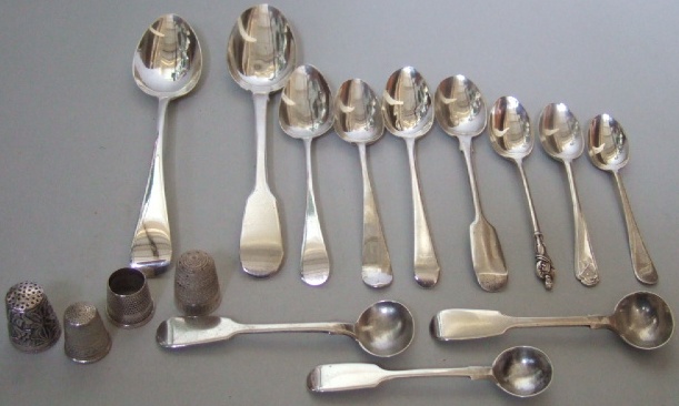 Appraisal: Two silver dessert spoons three silver condiment spoons seven further