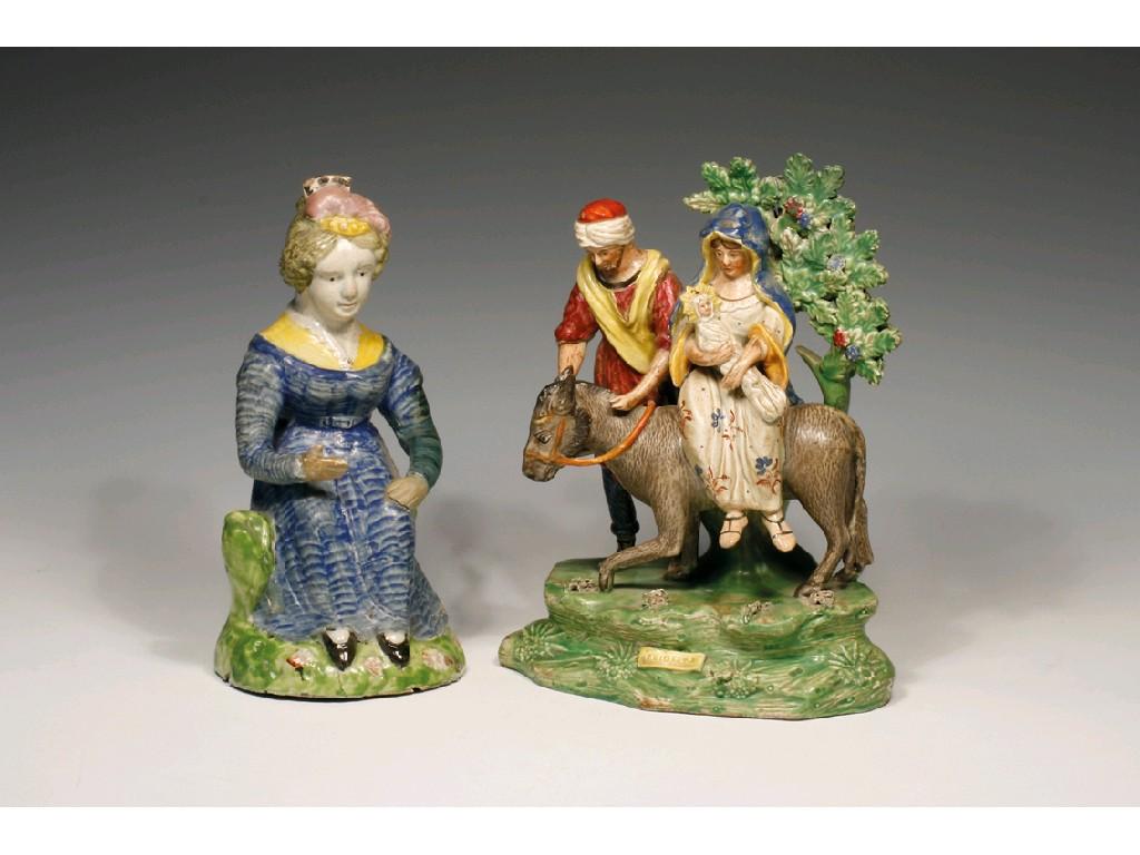 Appraisal: A WALTON TYPE STAFFORDSHIRE POTTERY GROUP The Flight to Egypt