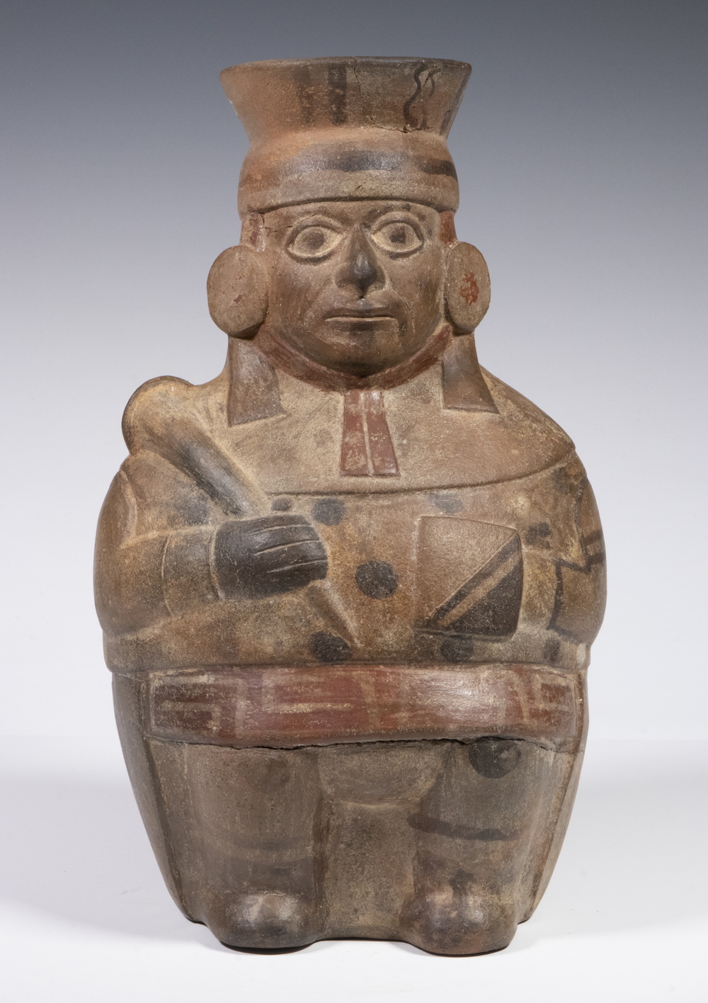 Appraisal: PERUVIAN FIGURAL VESSEL Standing Figure of a Warrior Mochica circa