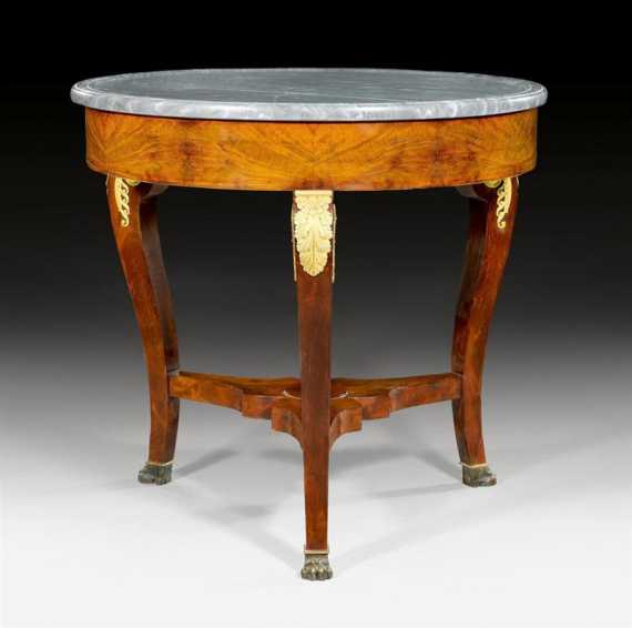 Appraisal: ROUND SALON TABLE AUX VOLUTES Empire Paris circa Mahogany with