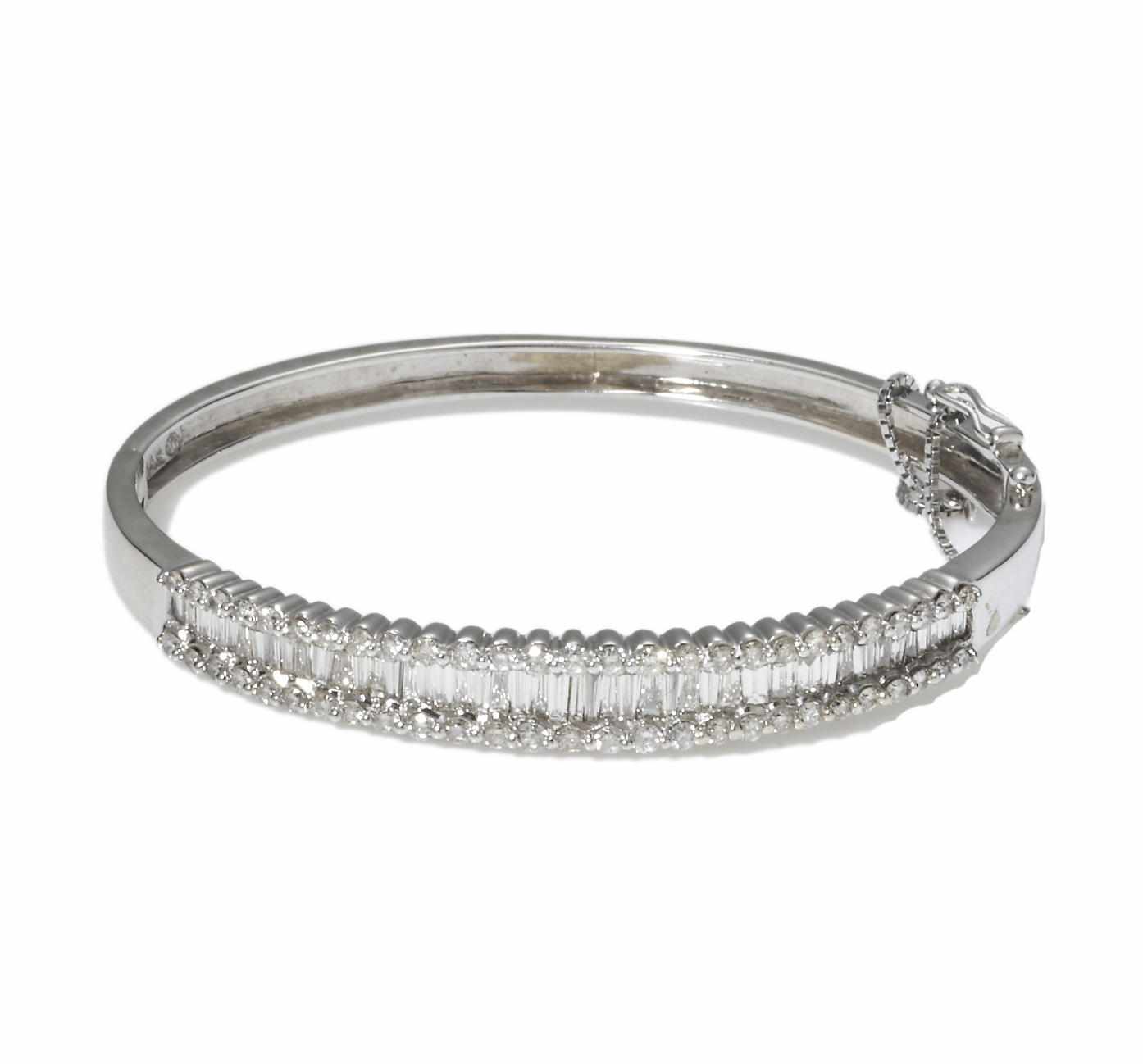 Appraisal: A diamond bangle bracelet estimated total diamond weight carats mounted