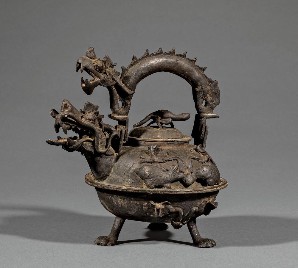 Appraisal: Japanese Iron Tea Kettle dragon head spout dragon form swivel