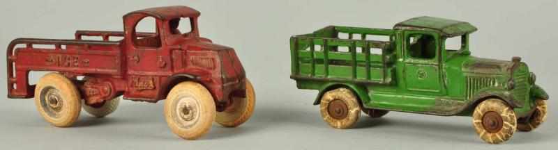 Appraisal: Lot of Cast Iron Arcade Truck Toys Description American Includes