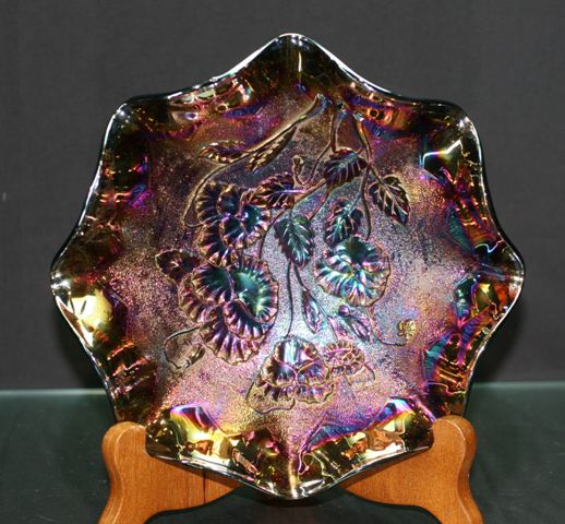 Appraisal: Black carnival glass frilled bowl with pansy decoration