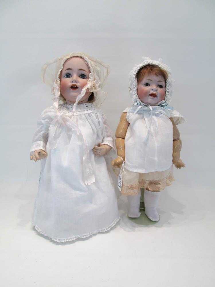 Appraisal: TWO KESTNER GERMAN BISQUE HEAD DOLLS each with sleep eyes