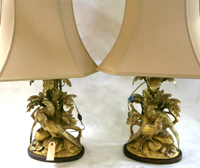 Appraisal: A PAIR OF CARVED GILTWOOD TABLE LAMPS each a bird