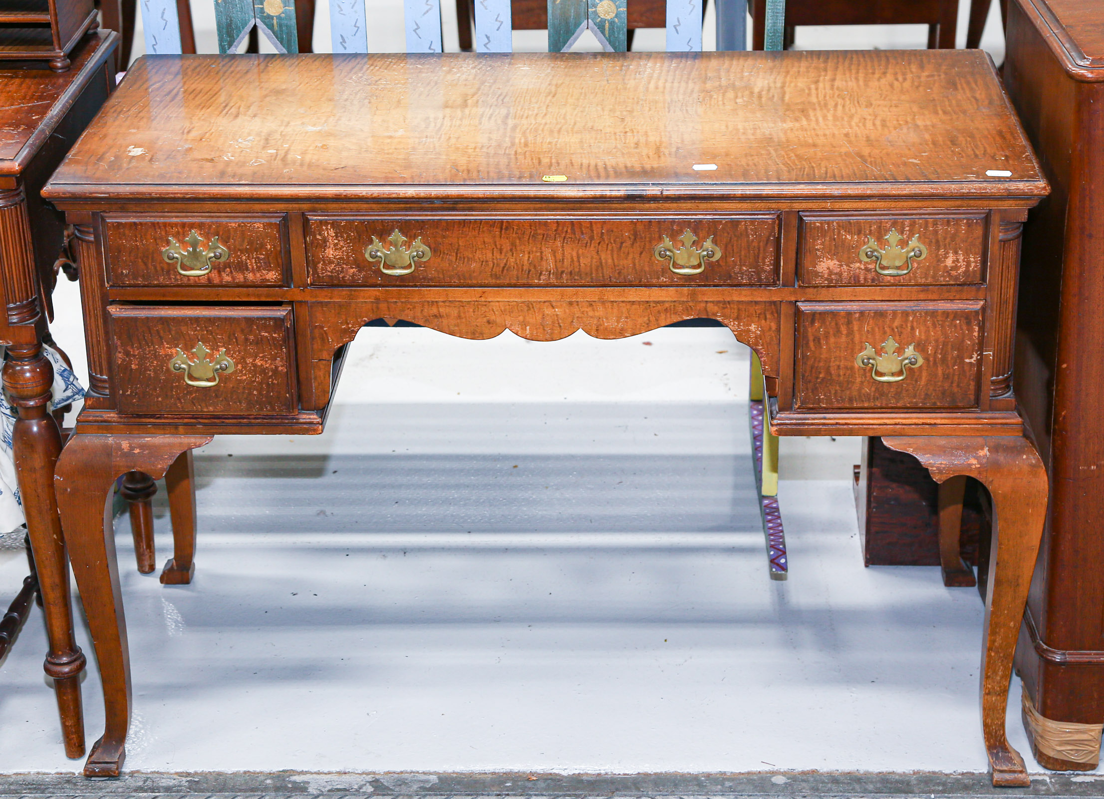 Appraisal: QUEEN ANNE STYLE FIGURED MAPLE DESK Mid th century in