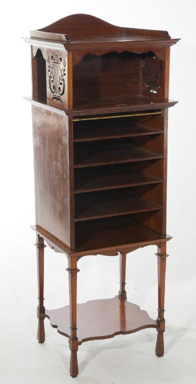 Appraisal: EDWARDIAN MAHOGANY MUSIC CABINET c the top with scroll gallery