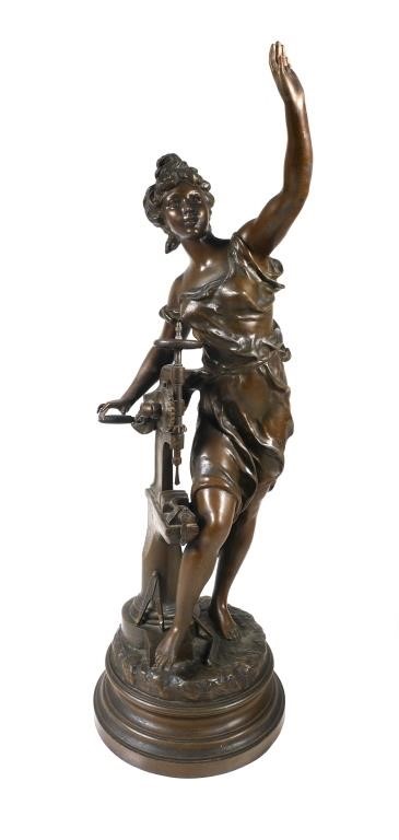 Appraisal: Cast metal sculpture with bronze finish of woman with drill