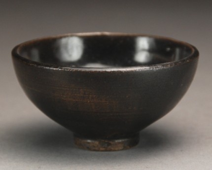 Appraisal: Well formed small bowl covered with thin black glaze interior