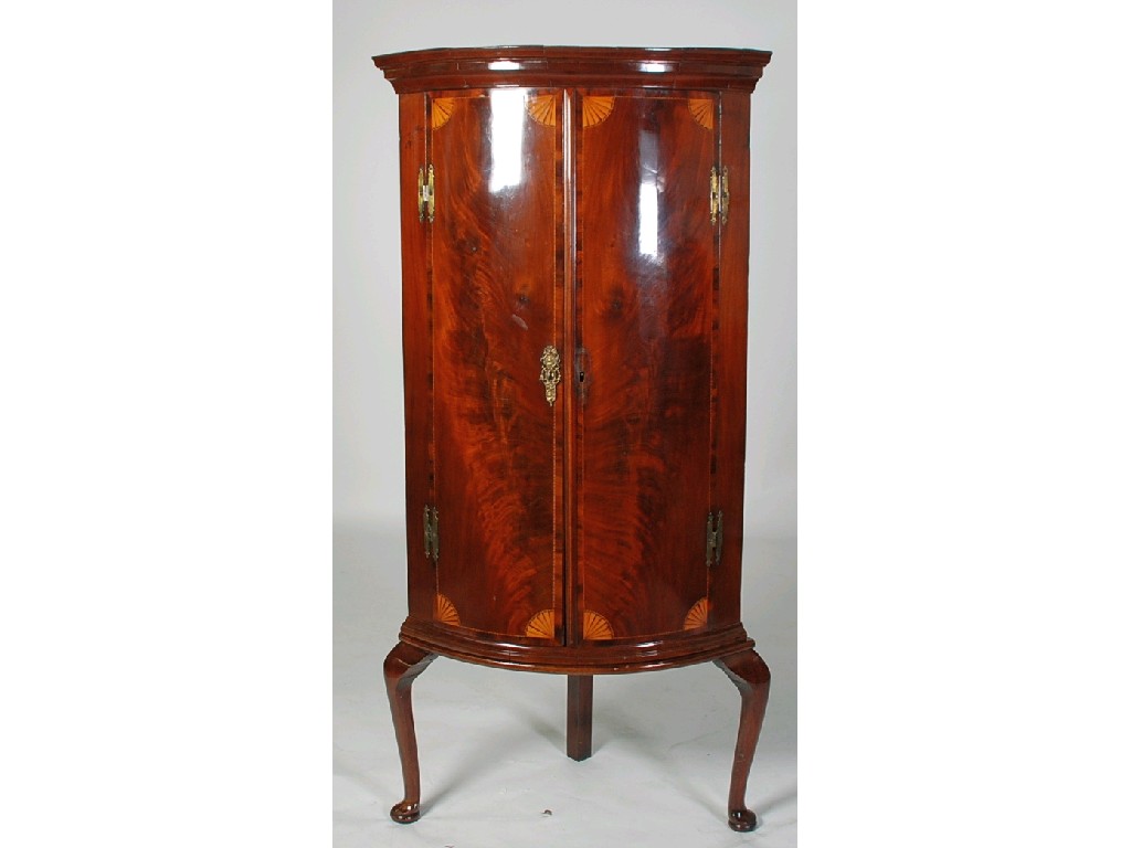 Appraisal: GEORGE III INLAID MAHOGANY BOW FRONT CORNER CUPBOARD the moulded