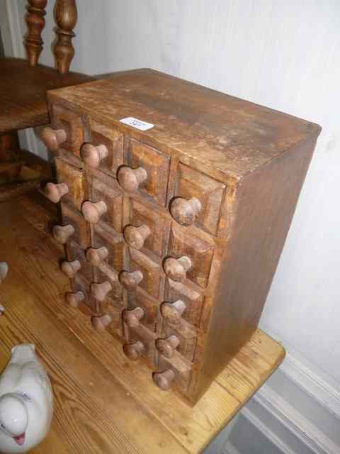 Appraisal: A MID TH CENTURY SET OF TWENTY SPICE DRAWERS wide