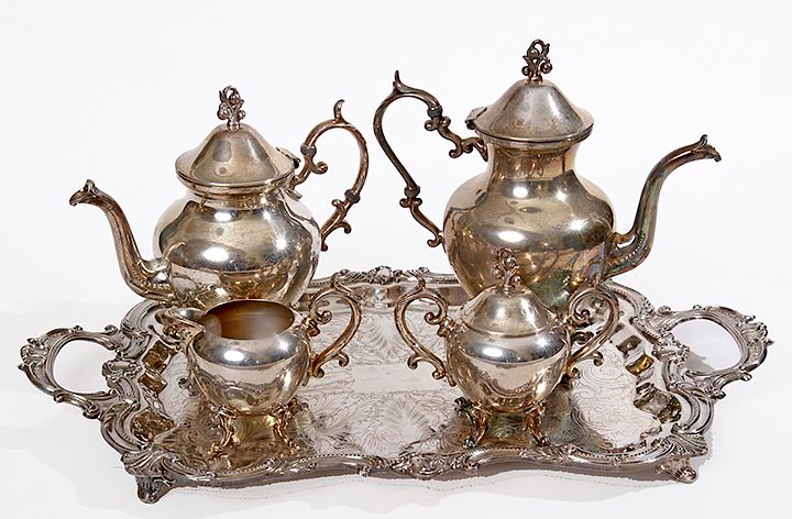 Appraisal: Silver Plate Tea Service A five piece tea service in