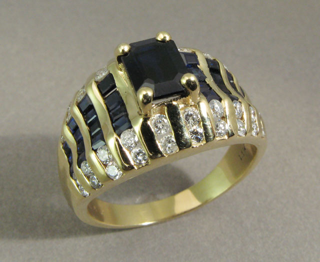 Appraisal: SAPPHIRE DIAMOND AND YELLOW GOLD RING The k yellow gold