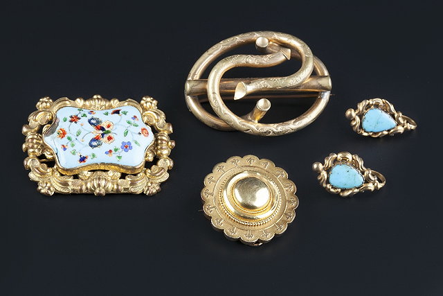 Appraisal: A Victorian panel brooch pendant designed as a circular boss