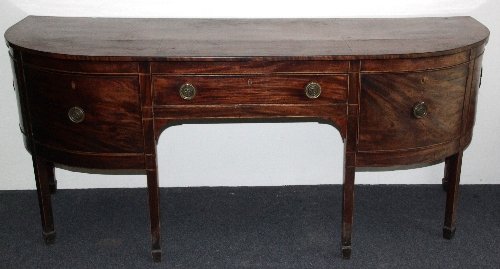 Appraisal: A George III mahogany bowfront sideboard circa with crossbanded top