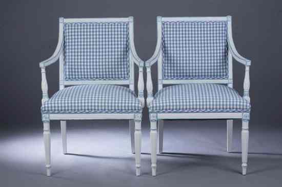 Appraisal: PAIR NEOCLASSICAL STYLE WHITE AND BLUE PAINTED OPEN-ARM CHAIRS Straight