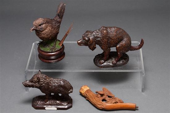 Appraisal: Three Continental carved wood animal figures and a figural pipe