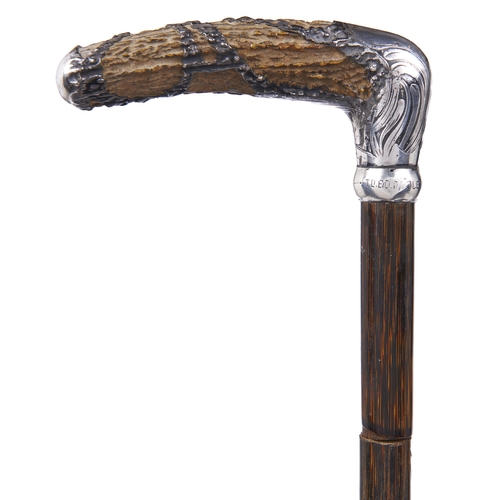 Appraisal: An American art nouveau silver and antler handled bamboo cane