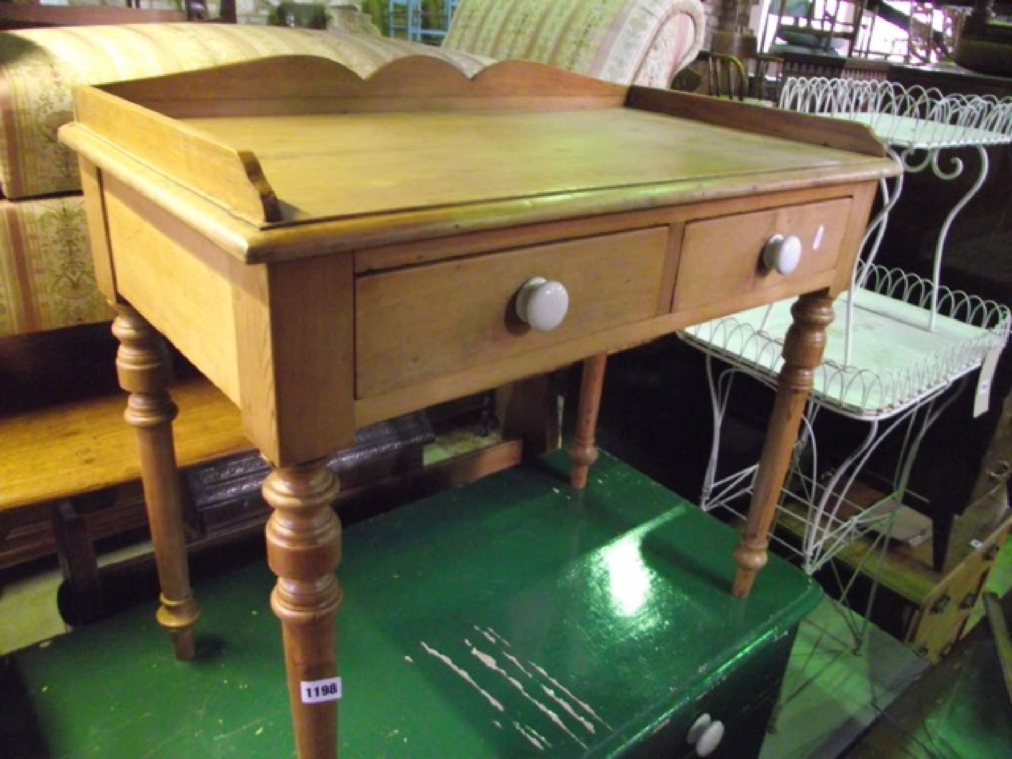 Appraisal: A small Victorian stripped pine side table washstand with shallow