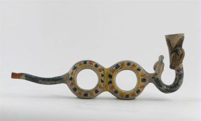 Appraisal: A Prattware novelty pipe coiled into a figure of eight