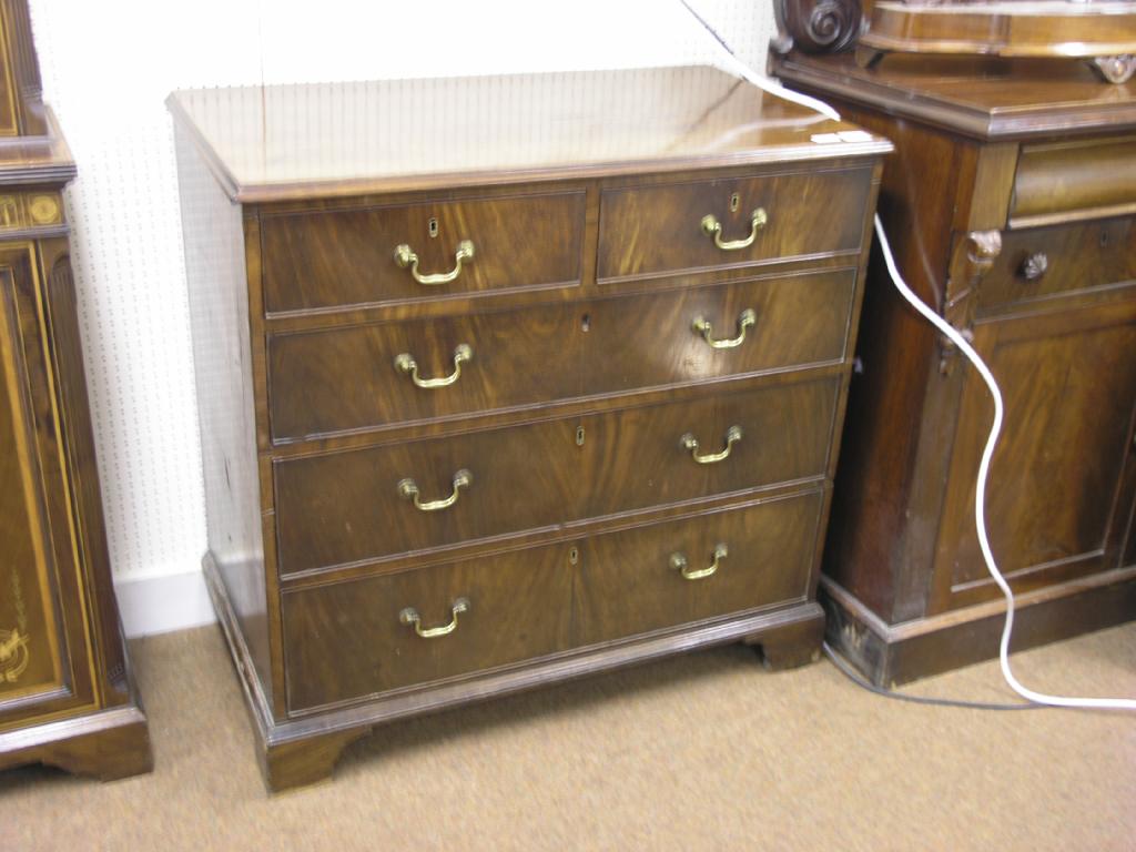 Appraisal: A George III mahogany chest of two short and three