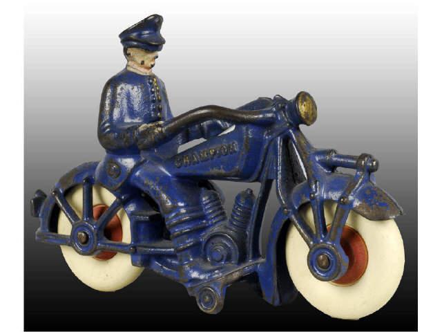 Appraisal: Cast Iron Champion Motorcycle Toy Description Cop driver Marked Champion