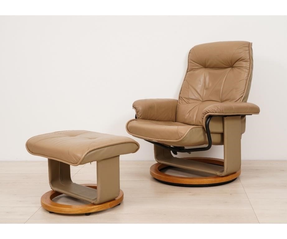 Appraisal: Chairworks modern design leather lounge chair and ottoman Chair h