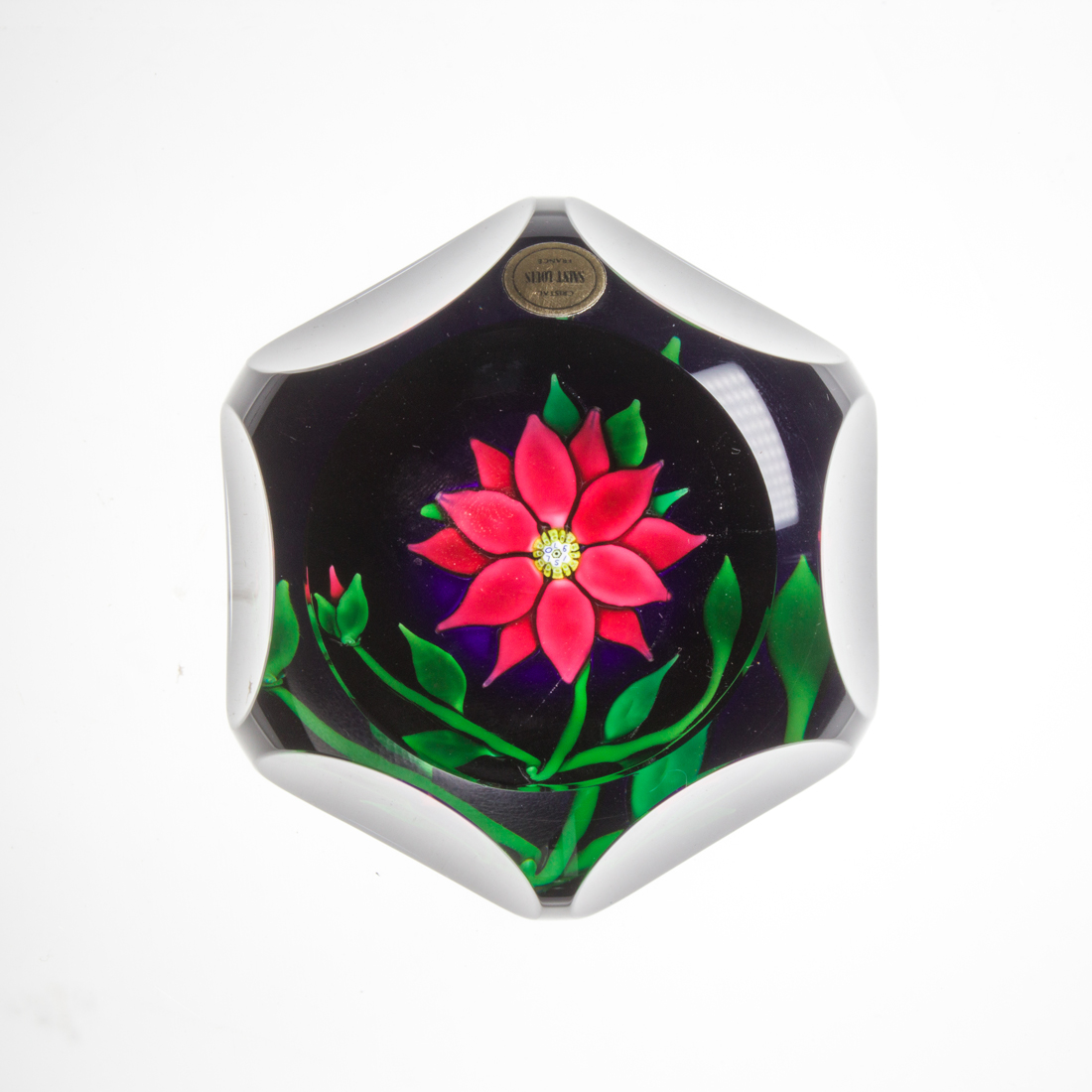 Appraisal: A SAINT-LOUIS GLASS POINSETTIA FACETED GLASS PAPERWEIGHT A Saint-Louis glass