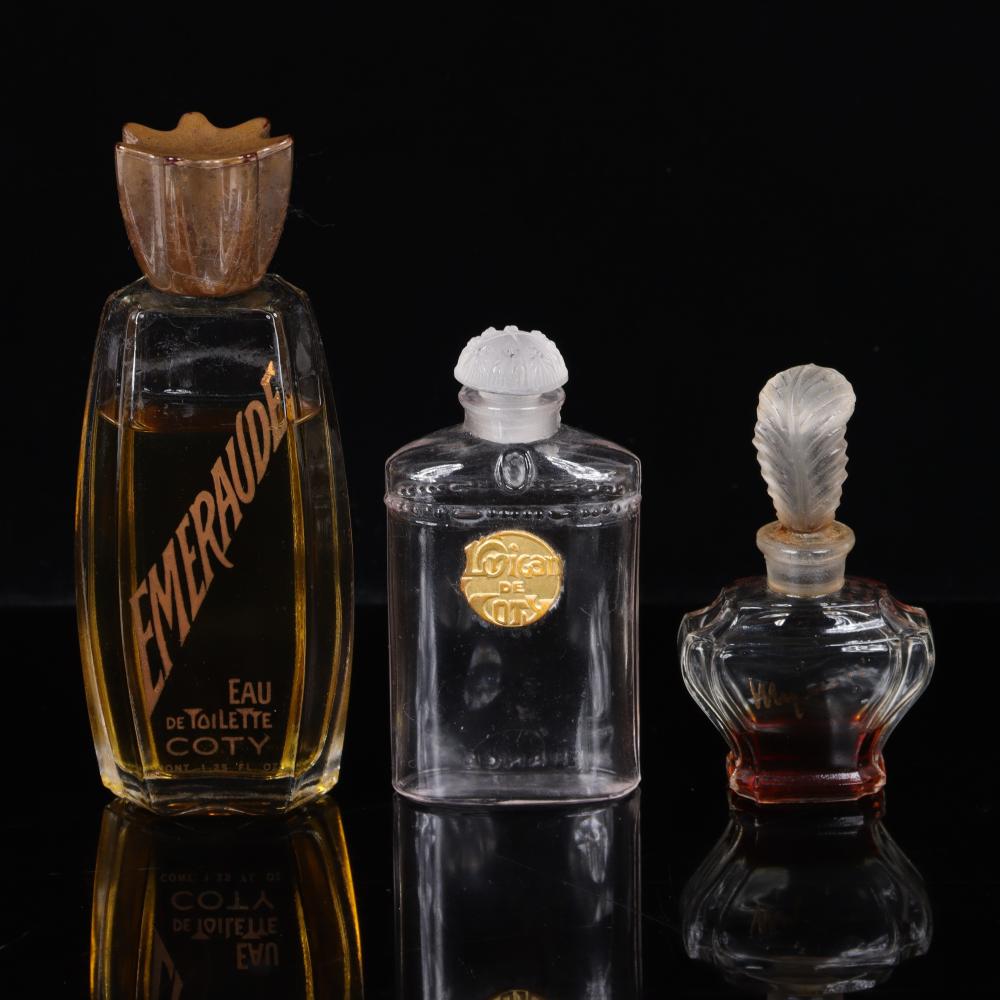 Appraisal: Three Vintage perfume scent bottles powder box Coty Emeraude bottle