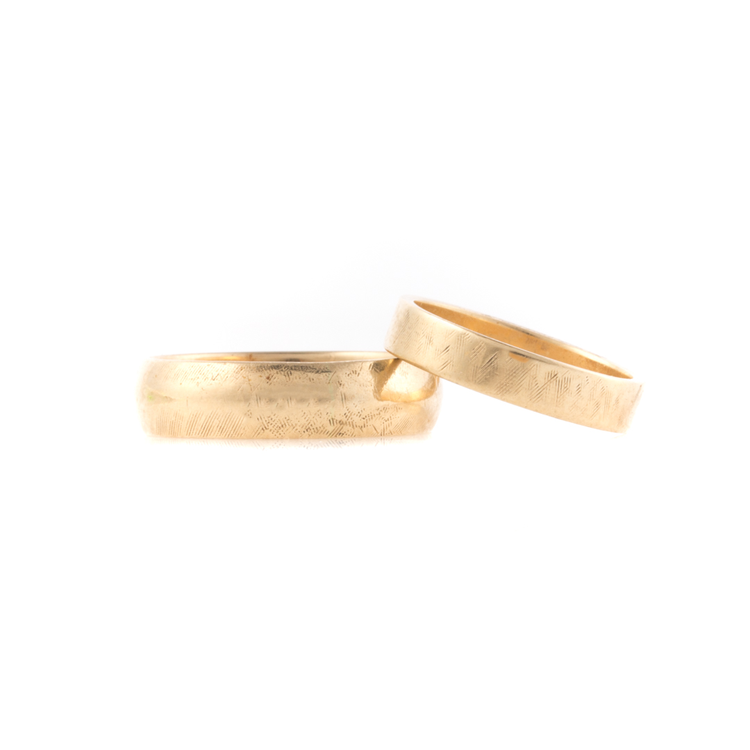 Appraisal: A Pair of Gold Wedding Rings K yellow gold half