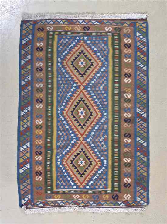 Appraisal: A Kilim Wool Flatweave Rug having three diamond form center