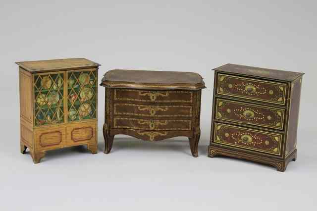 Appraisal: THREE FURNITURE FORM TINS Lithographed examples comprising a Huntley Palmers