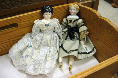 Appraisal: TWO CHINA HEAD SHOULDER DOLLS in and in One with