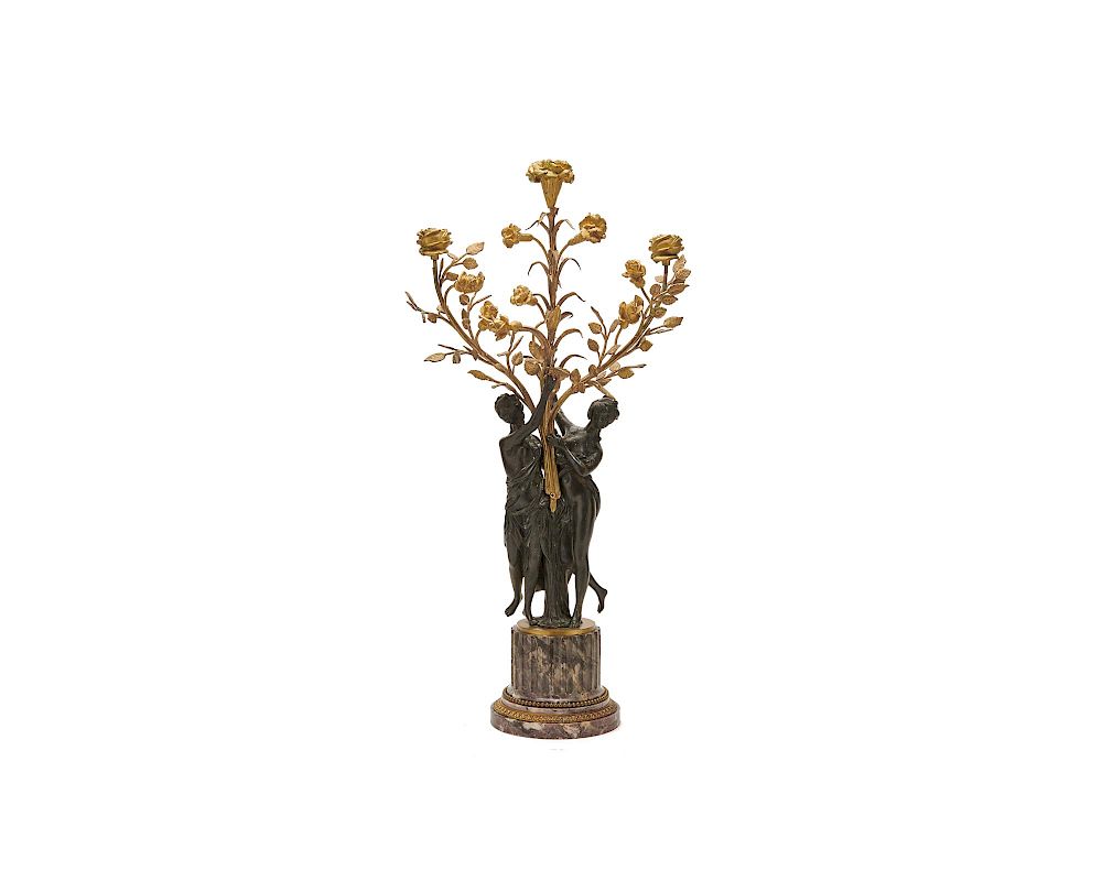 Appraisal: Continental Patinated and Gilt Bronze Figural Three Light Candelabra ca