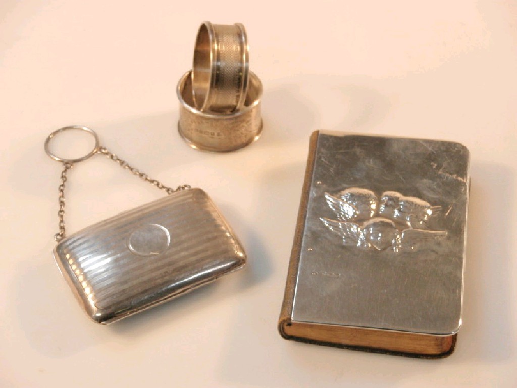 Appraisal: A George V silver purse with engine turned detail hung