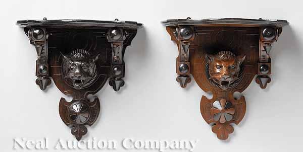 Appraisal: A Pair of American Renaissance Carved Walnut Lion Head Wall