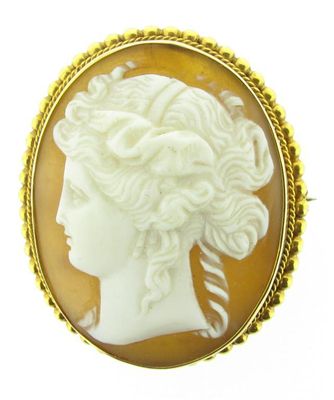 Appraisal: A Victorian carved shell cameo brooch Depicting the profile of