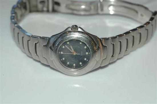 Appraisal: A LADIES QUARTZ GUESS WRISTWATCH TO A STAINLESS STEEL CASE