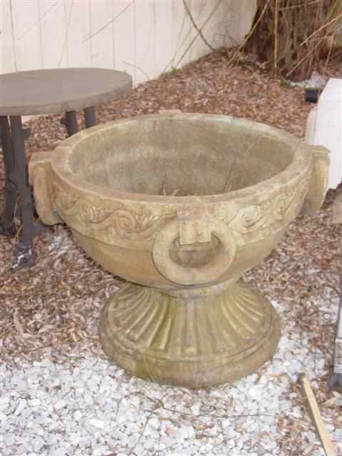 Appraisal: PAIR OF CAST STONE URNS WITH MOLDED RING HANDLES Each