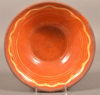 Appraisal: th Century Yellow Slip Redware Bowl th Century Pumpkin Glazed