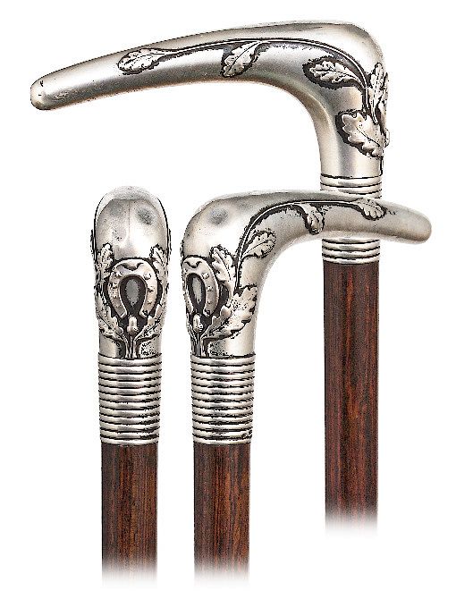 Appraisal: Silver Mascot Cane- Exclusive on Bidsquare Silver Mascot Cane-Ca -L-shaped