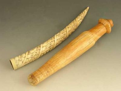 Appraisal: A West African carved ivory tusk with continuous spiral decoration